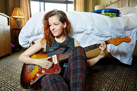 Singer-songwriter Neko Case poses at a hotel in New Yor on July 9, 2013.