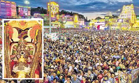 Lord Malayappa Swamy blesses devotees from Garuda Vahanam at Tirumala on Sunday.