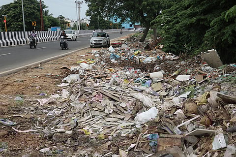Debris materials from construction, dumped along the ghat road in Valparai