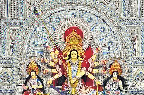 In a first, Odisha's Jharpada pandal unveils gold crowns for all its deities