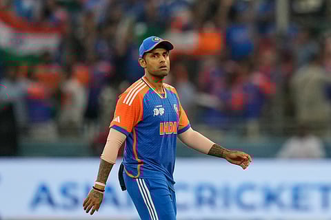 India's captain Suryakumar Yadav walks back after the first innings during the Asia Cup cricket final between India and Pakistan at Dubai International Cricket Stadium, United Arab Emirates, Sunday, Sept. 28, 2025.