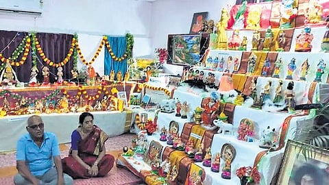 M Venkat Rao and wife displaying various dolls on the occasion of Bommala Koluvu.
