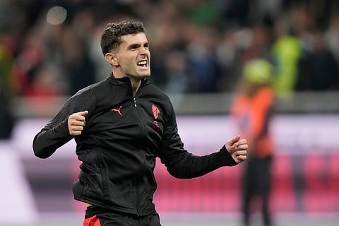 AC Milan's Christian Pulisic celebrates after the Serie A soccer match between AC Milan and Napoli at the San Siro stadium in Milan, Italy, Sunday, Sept. 28, 2025.