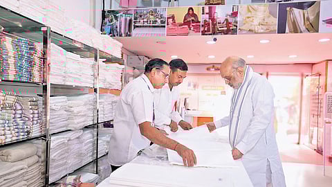 Union Home Minister Amit Shah at a khadi shop in New Delhi.