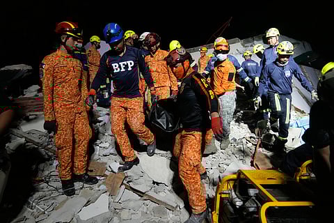 Business establishments that were damaged due to a recent strong earthquake lie in Bogo city pier, Cebu Province, Central Philippines, Friday, Oct. 3, 2025. 