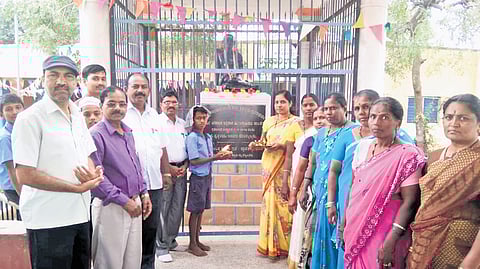 Residents of Jakkali village in Gadag district pray to Mahatma Gandhi in a temple dedicated to him 