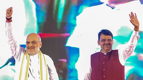 Union Home Minister Amit Shah and Maharashtra Chief Minister Devendra Fadnavis during a farmers' rally after the inauguration of the expanded capacity of Dr Vitthalrao Vikhe Patil Cooperative Sugar Factory, in Ahilyanagar district, Maharashtra.