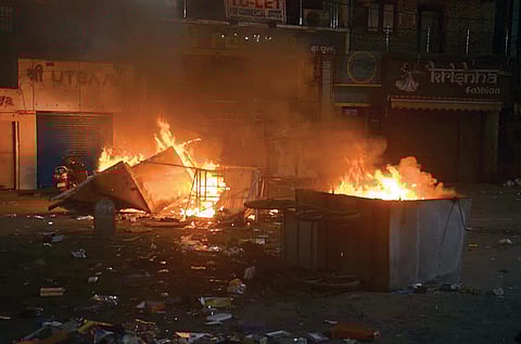 The mob allegedly set a few cabins of street vendors on fire besides vandalising some shops and two-wheelers in the area.