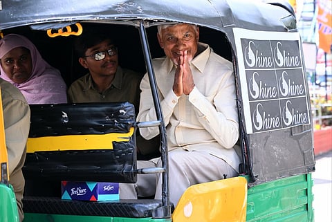 CM Nara Chandrababu Naidu travels in auto to the venue where Auto Driverla Sevalo program is organised in Vijayawada on Saturday.