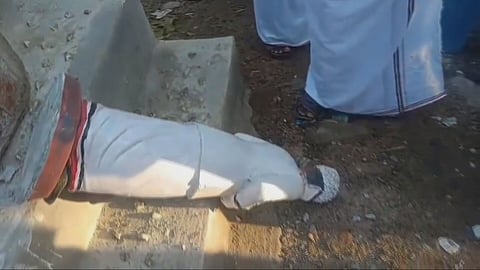 The vandalised MGR statue in Madurai.