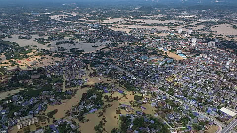 This aerial image shows flooding in the aftermath of Typhoon Matmo in Thai Nguyen, Vietnam, Wednesday, Oct. 8, 2025.