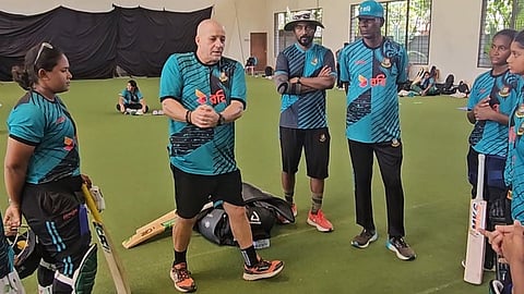 Power hitting coach Julian Wood with the Bangladesh women players and coaches