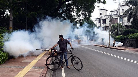 A North Delhi MCD worker fumigates as part of preventive measures against mosquito-borne diseases Dengue, Malaria and Chikungunya, at Flag Staff Road in New Delhi on Tuesday, Aug. 25, 2020.