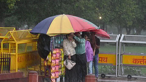 Heavy rain on Tuesday afternoon following overnight showers led to a dip in temperature across the capital.