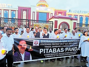Lawyers take out a candlelight march in the capital city on Wednesday