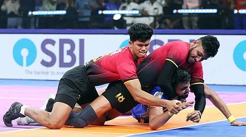 Defender from Tamil Nadu Deepak Sankar (L) in action 
