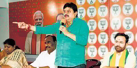 BJP state president N Ramchander Rao gestures as he addresses a party meeting on the upcoming Jubliee Hills byelection in Hyderabad on Friday