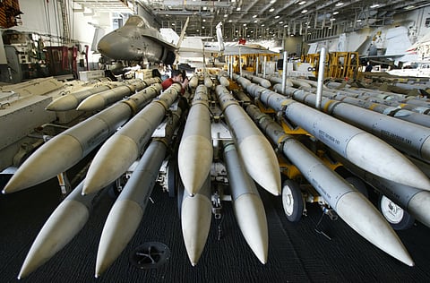 A view of the stacked AMRAAM missiles in the hangar bay of the USS Kitty Hawk.