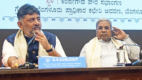 Chief Minister Siddaramaiah (R) and Deputy Chief Minister D K Shiva Kumar during the Greater Bengaluru Authority ( GBA ) meeting at GBA head office, in Bengaluru on Friday. 