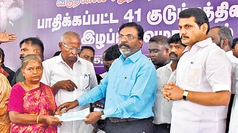 VCK leader Thol Thirumavalavan distributes assistance to the family of victims of Karur stampede.