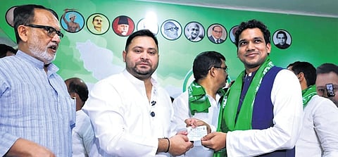 In this image from Aug. 17, 2025, Lok Sabha LoP and Congress leader Rahul Gandhi is seen with RJD Chief Lalu Prasad Yadav and Leader of the Opposition in Bihar Assembly Tejashwi Yadav during the Voter Adhikar Rally in Sasaram.