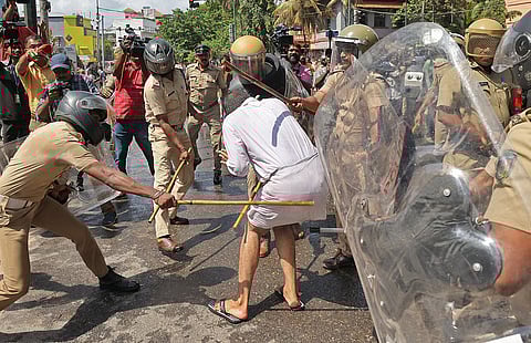 A Youth Congress worker was surrounded and beaten up by the police during a protest against CM Pinarayi Vijayan, reportedly over the Sabarimala gold-plating row.