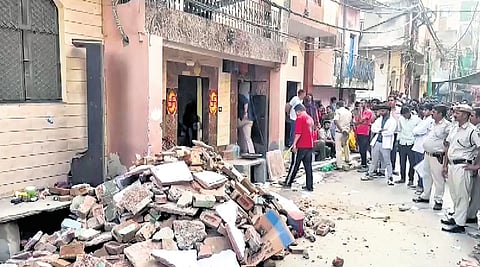 Rescue operations underway at a building collapse in Uttam Nagar area on Friday.