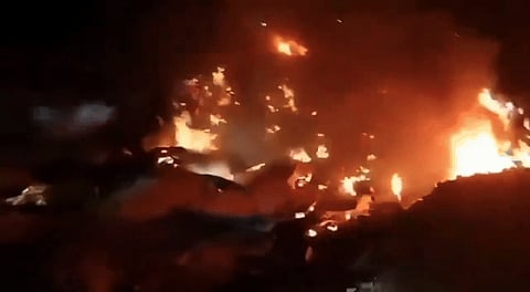 Afghan servicemen guard along the border in the Zazai Maidan district of Khost province, Afghanistan, Sunday, Oct. 12, 2025, after overnight clashes with Pakistan's forces.