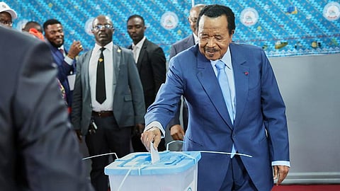 President Paul Biya casts his ballot at the Government Bilingual primary school Bastos in Yaounde, Cameroon, Saturday, Oct. 12, 2025.