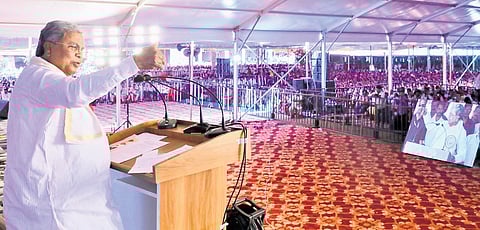 Chief Minister Siddaramaiah addresses a religious harmony event at 
Rabkavi Banhatti taluk in Bagalkot district on Monday  