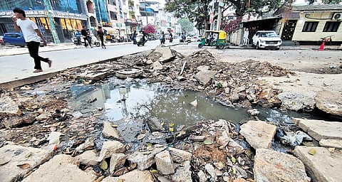 Due to delayed white-topping works on Mosque Road in Fraser Town, pedestrians and shopkeepers have been facing problems for a couple of months 