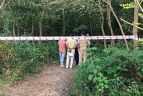 Police officials probe site of alleged gang rape of MBBS student from Odisha, in Durgapur, West Bengal, Sunday, Oct. 12, 2025.