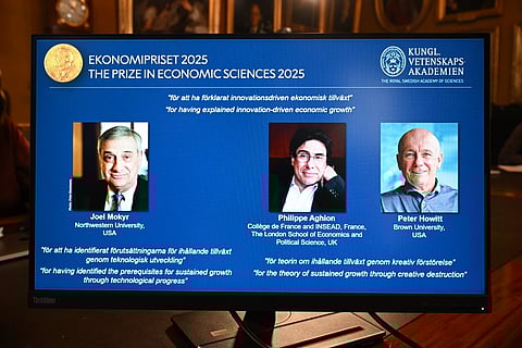 A screen displays the portraits of the 2025 prize winners during the announcement at the Royal Swedish Academy of Sciences in Stockholm (Photo | AFP)