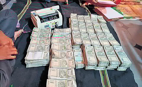 Rs 83.09 lakh in cash sezied from the residence of an official in Bidar.