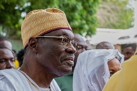 Presidential opposition candidate Issa Tchiroma arrives to casts his ballot at a polling station in Garoua, Cameroon, Sunday, Oct. 12, 2025.