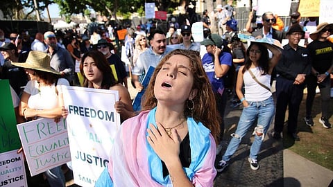 Supporters gather during an immigration rally on Saturday, Sept. 20, 2025, in Los Angeles. 