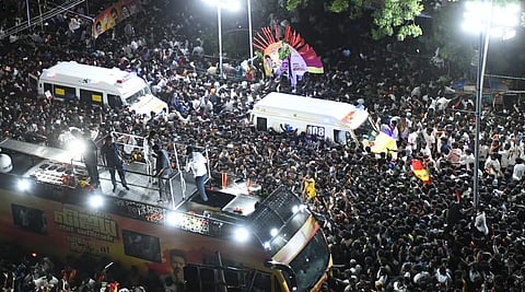 Ambulances moving through the crowd at Vijay's rally in Karur.