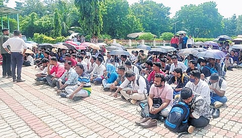 Students staging a demonstration on the campus of Berhampur University 