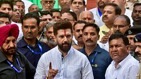 Union Minister and Lok Janshakti Party (Ram Vilas) Chief Chirag Paswan speaks to the media as he meets the family members of Haryana IPS officer Y. Puran Kumar, in Chandigarh, Tuesday, Oct. 14, 2025. 