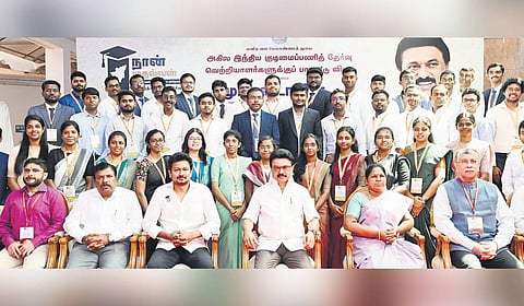 Chief Minister MK Stalin and Deputy CM Udhayanidhi Stalin with Naan Mudhalvan beneficiaries who cleared UPSC exam 