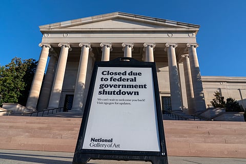 With the government shutdown now in its third week, a sign turns away tourists at the entrance to the Capitol Visitor Center in Washington, Wednesday, Oct. 15, 2025.