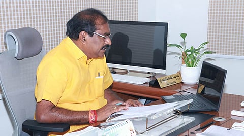  Water Resource  Minister and Kurnool district in-charge Minister Nimmala Ramanaidu addressing an irrigation department meeting in kurnool city on Tuesday. 