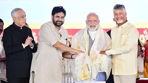 PM Narendra Modi, CM Nara Chandrababu Naidu and deputy CM Pawan Kalyan during the Super GST Super Savings public meeting at Kurnool on Thursday. 