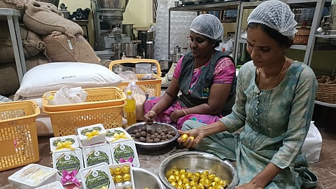  In Uppiliyapuram, members of a women's self-help group led by Latha have doubled their output to 8,000 laddus this year to meet the festive rush. 