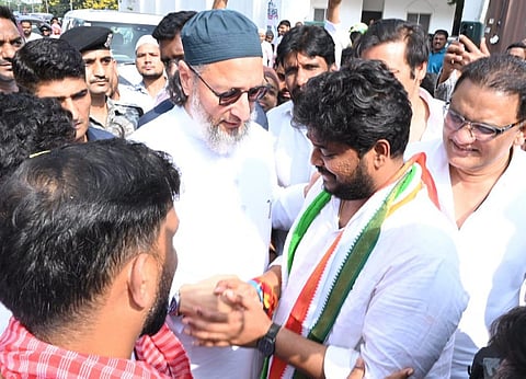 Congress Jubilee Hills candidate Naveen Yadav meets AIMIM president and Hyderabad MP Asaduddin Owaisi after filing his nomination for the byelection in Hyderabad on Friday 