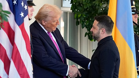 President Donald Trump, left, greets Ukraine's President Volodymyr Zelenskyy at the White House, Friday, Oct. 17, 2025, in Washington