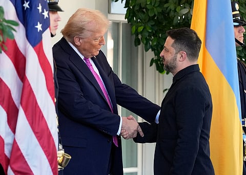 President Donald Trump, left, greets Ukraine's President Volodymyr Zelenskyy at the White House, Friday, Oct. 17, 2025, in Washington