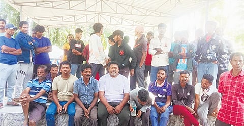 Sanitation workers staging dharna in front of Jeypore municipality office.
