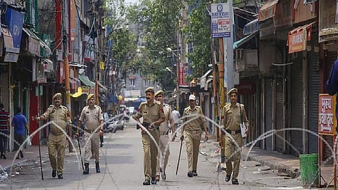 Tensions escalated on Tuesday as members of both communities blocked the National Highway near the Karigaon outpost, burnt tyres, and set fire to a few houses.
