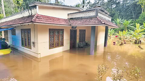 A house at Thannimood, Nedumkandam, submerged in the heavy rain that lashed Idukki district on Saturday 